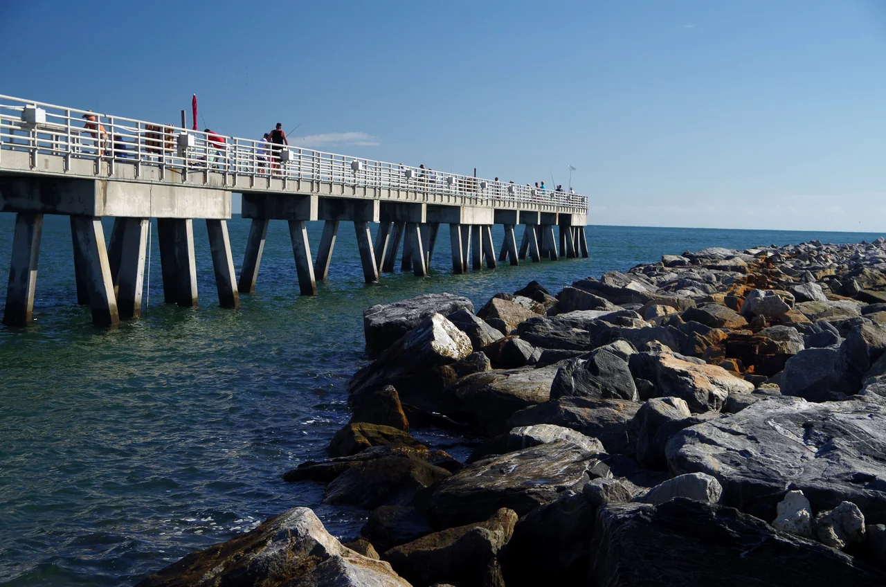 Fishing pier and Atlantic water at Jetty Park, Cape Canaveral